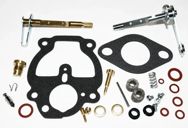 Allis-Chalmers Allis Chalmers B IB C RC Zenith Carburetor Repair Kit, includes black gaskets, metal screws, washers, and other small parts for carburetor maintenance.