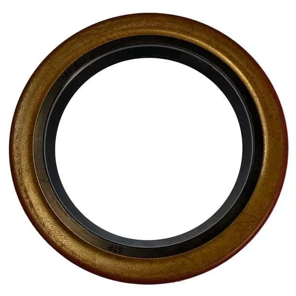 A circular input shaft seal for Allis-Chalmers D21 tractor, with a golden outer ring and a black inner seal.