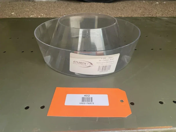 Allis-Chalmers 10-1/2 Pre-Cleaner Bowl, clear plastic bowl used in agricultural machinery cleaning system.