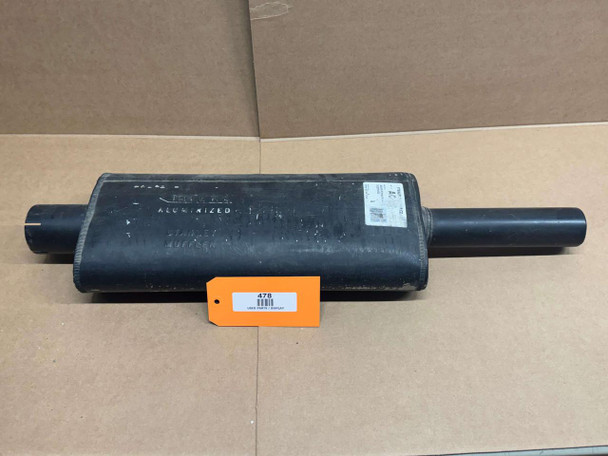Allis Chalmers D15 D17 Diesel Muffler, display model of an automotive muffler for diesel engines, black metal with emission labels and a connected pipe.