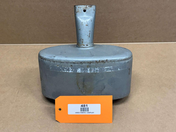 Allis Chalmers B IB C CA Under Hood Muffler, display of a used engine muffler with a cylindrical body and outlet pipe, showing signs of wear and rust.