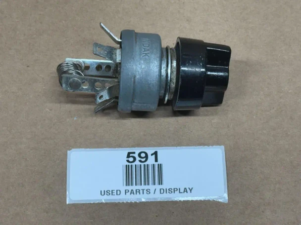 Allis-Chalmers Light Switch w/ Knob 70249142, display image of a used electrical light switch with a black knob and metal components.