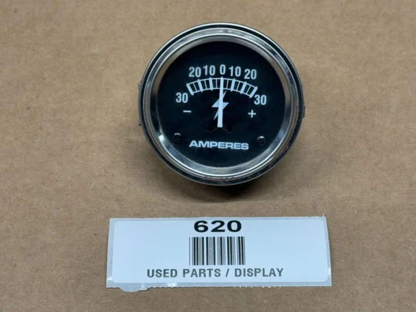 Ammeter Amp Gauge (30-0-30) Display, round electrical ammeter gauge with black dial and silver bezel, measuring amperes in a vehicle or electrical system.