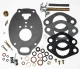 Allis-Chalmers WD45 D17 Marvel Schebler Carburetor Repair Kit, assortment of gaskets, screws, springs, and small engine repair parts laid out on a white background.