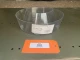 Allis-Chalmers 10-1/2 Pre-Cleaner Bowl, clear plastic bowl used in agricultural machinery cleaning system.