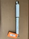 Seat Shock Absorber Fits Monroe Seat, display image of a white shock absorber for a vehicle seat with a tag labeled '433' placed on a brown surface.