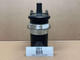 12 Volt Coil with Internal Resistor (Display), industrial electrical relay coil with black cylindrical body and metal terminals on top.