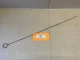 Allis-Chalmers G Choke Rod, AC-344D, 70800118, displaying a long metal choke rod with a loop handle at one end on a beige surface.