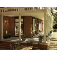 Progress Lighting Bradshaw Collection One-Light Textured Black Clear Glass Transitional Large Outdoor Wall Lantern - Wet Location Listed Application Shot Model P560349-031
