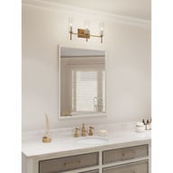 Progress Lighting Elara Collection Three-Light Vintage Brass Clear Glass New Traditional Bath Vanity Light - Damp Location Listed Application Shot Model P300358-163