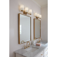 Progress Lighting Estrada Collection Three-Light Brushed Gold Contemporary Bath & Vanity Light - Damp Location Listed Application Shot Model P300478-191
