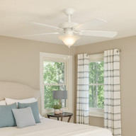 52 inch white 5-blade ceiling fan with pull chain, frosted bowl light, 3000K warm white, shown installed in a bright modern bedroom.