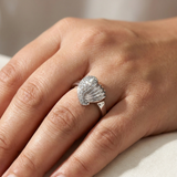 Diamond heart ring shown on model hand, 14K white gold wide band with flush-set diamonds