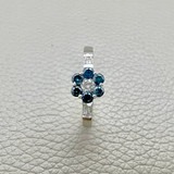 0.61tcw diamond engagement ring in cluster setting — three-quarter angle