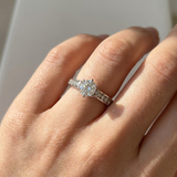 1.00tcw round-cut diamond engagement ring in channel-set setting — three-quarter angle (2)