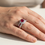 Antique style vintage ruby ring, diamond halo in 14kt white gold, worn on hand
