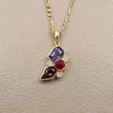 Close-up of Zoisite, Red Spinel, and Diamond pendant