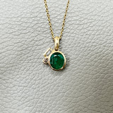 Handcrafted Oval Cut Zambian Emerald Necklace with Diamond Baguette