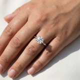 0.60tcw round-cut diamond engagement ring in solitaire setting in white gold — three-quarter angle (2)