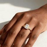 1.50ct radiant-cut diamond engagement ring in three-stone setting — front view