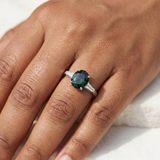 Natural green sapphire oval engagement ring three stone white gold model worn on hand