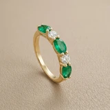 Five marquise-cut emeralds in 14kt yellow gold band top-down view