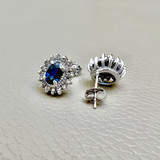 Sophisticated 1.24tcw Blue Sapphire Earrings with Diamond Accents in White Gold.