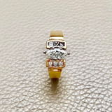 Elegant Marquise and Princess Cut Diamond Ring in 14kt Yellow Gold.