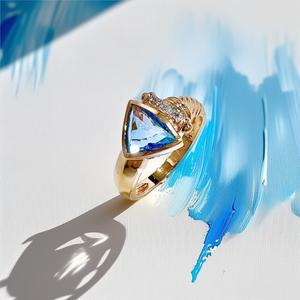 14kt Yellow Gold Ring with Radiant Blue Topaz and Diamond Accent