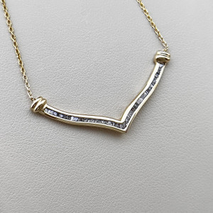 Baguette diamond V necklace featuring 0.23tcw diamonds, crafted in elegant 14kt white gold for a modern and sophisticated look Treasured & Co.