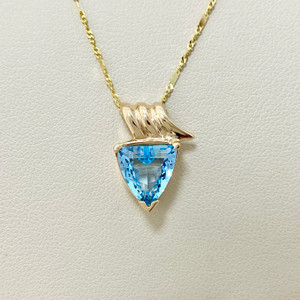 Trillion blue topaz pendant necklace featuring a 2.08tcw gemstone, crafted in unique 14kt gold for her Treasured & Co.