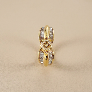 Vintage diamond engagement ring, 0.92tcw gray diamond center with tapered baguette sides in 14kt yellow gold, front view