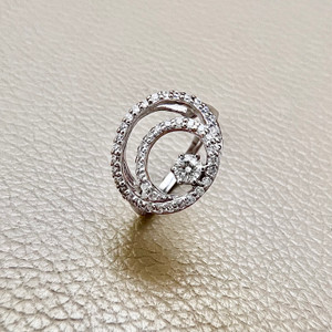 14kt white gold open circle ring with 0.79tcw diamonds, offering a unique and elegant design for a bold statement piece Treasured & Co.