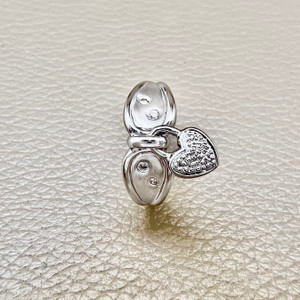 0.08tcw moving heart diamond ring in 14kt white gold, a unique and meaningful gift for the special woman in your life Treasured & Co.