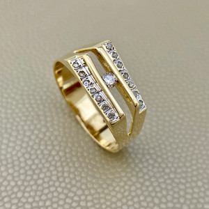 Treasured & Co. 14kt yellow gold diamond band with 0.20tcw diamonds, designed for both men and women, offering a timeless and unique style.