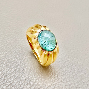 18kt gold cabochon tourmaline ring with 3.19tcw, set with a light blue tourmaline, offering a striking statement ring for both men and women Treasured & Co.