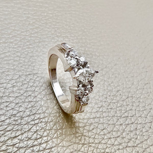 Treasured & Co. marquise diamond engagement ring 0.40tcw, featuring a 0.30ct marquise center diamond with round and baguette diamonds, set in 14kt white gold. A bold and elegant design for your engagement.