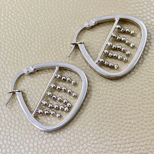 Beads fashion hoops in 14kt white gold. Trendy and fashionable hoop earrings for any occasion by Treasured & Co., Astoria.