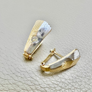 0.76tcw two-tone earrings zirconia, featuring lever back design in 14kt white and yellow gold. A unique zirconia earring set from Treasured & Co.