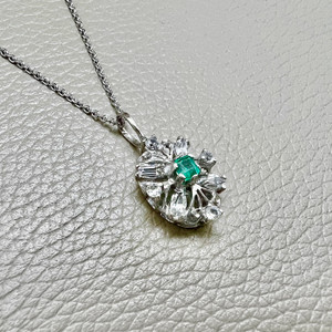 Unique emerald diamond pendant necklace 0.60tcw, set in 14kt white gold. A vintage-inspired design, perfect for women by Treasured & Co., Astoria, New York.