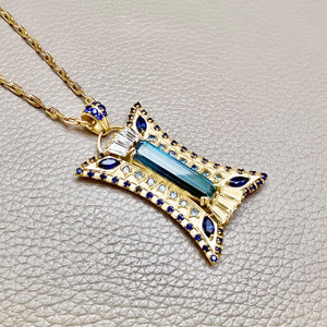Blue tourmaline luxury pendant necklace 14kt gold encapsulated Blue tourmaline luxury pendant necklace 14kt gold encapsulated