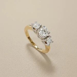 Three stone round diamond engagement ring 0.77tcw two tone 14kt white yellow gold angle view