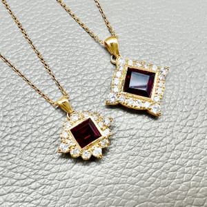 Garnet & diamond halo pendant necklace in 14k yellow gold Garnet & diamond halo pendant necklace in 14k yellow gold
