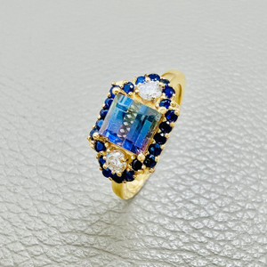 Bi color tourmaline ring with blue and purple hues in 14kt gold Bi color tourmaline ring with blue and purple hues in 14kt gold