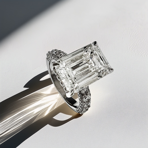 side view of emerald cut diamond ring with 3.85 mm white gold band side view of emerald cut diamond ring with 3.85 mm white gold band