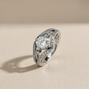 Round-cut diamond engagement ring in split-shank setting — close-up detail