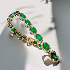 detailed view of emerald and diamond setting on gemstone bracelet detailed view of emerald and diamond setting on gemstone bracelet