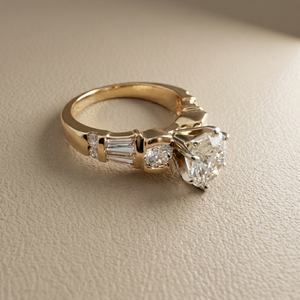 Natural oval diamond engagement ring baguette accent diamonds 14kt yellow gold side view