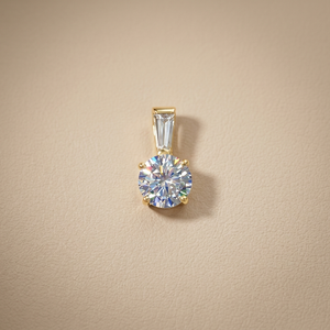 Tapered baguette and round cubic zirconia pendant necklace 14kt yellow gold front view