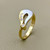 Treasured & Co. gold fashion ring with 0.16tcw diamonds, a sleek and modern accessory for understated style.